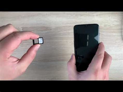 How to insert SIM card into OnePlus 6T .